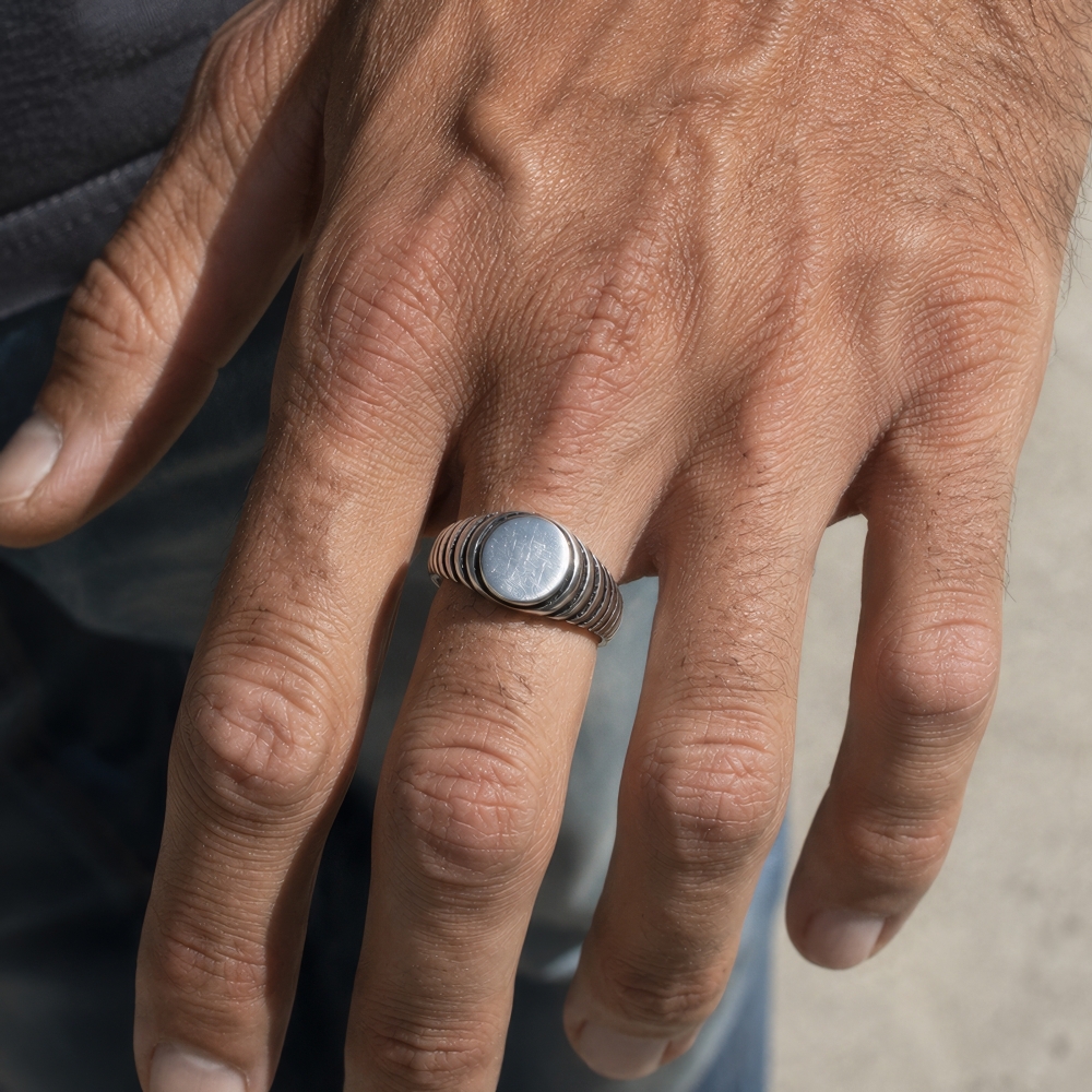 Silver signet ring with an ethnic vintage spirit